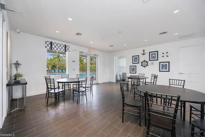 Dining area featuring recessed lighting and wood finish floors