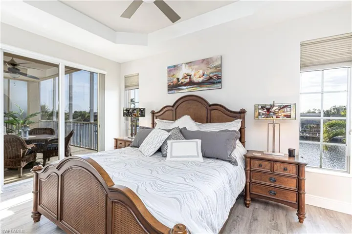 bright and spacious owners suite has sliders to the oversized lanai!