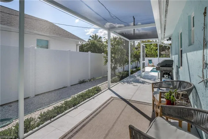 View of patio featuring a fenced backyard and area for grilling