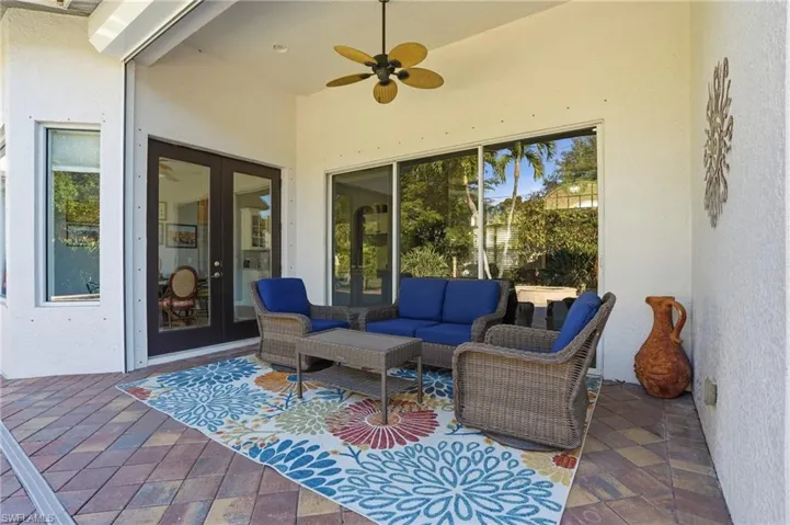 View of patio / terrace featuring outdoor lounge area, french doors, and ceiling fan