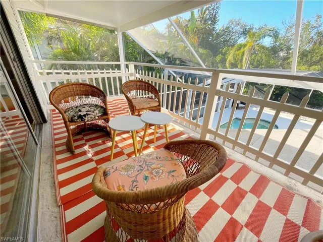 Balcony with view of pool