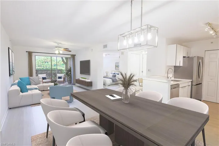 Dining area featuring ceiling fan, visible vents, and light wood-style floors