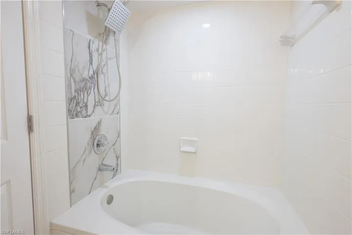 Full bathroom featuring shower / tub combination
