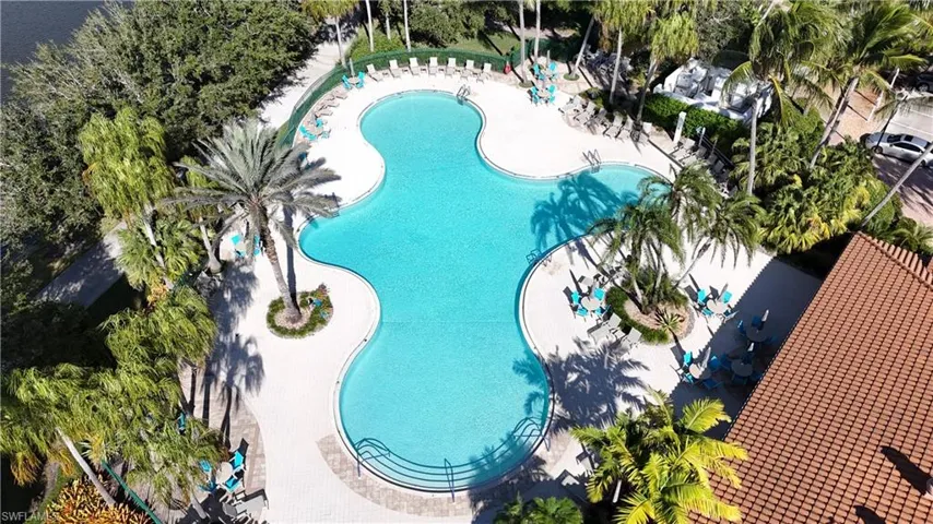 Community pool featuring a patio area