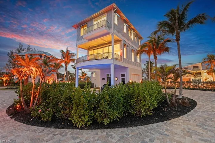 Rear view of house with a balcony