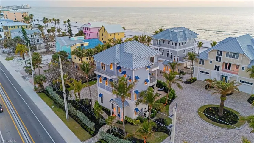 Bird's eye view with a water view and a residential view