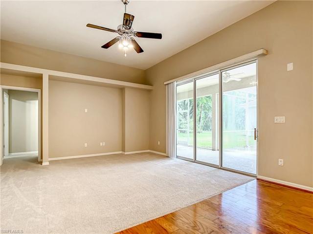 Family room with sliding doors to screened lanai