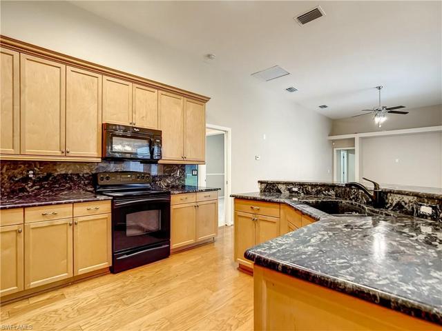 The kitchen has under cabinet lighting