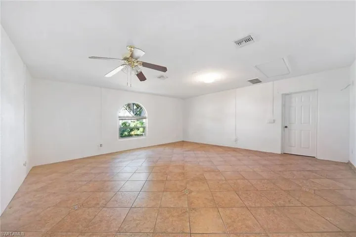 Large room that can be used as a craft room, an exercise room, a theater room or??  The options are endless!  Maybe a mother-in-law suite?