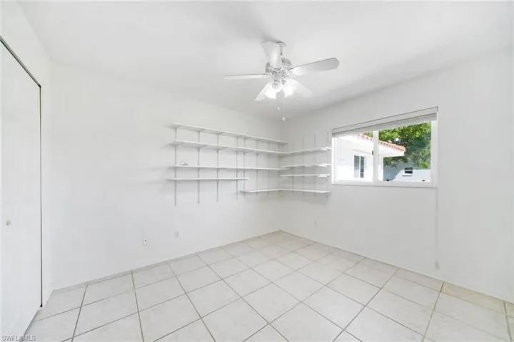 Unfurnished room featuring ceiling fan