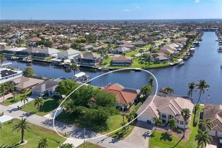 Bird's eye view with a residential view and a water view
