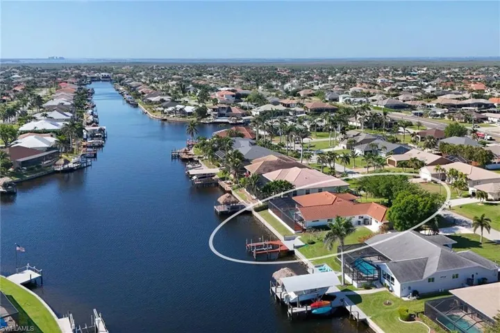 Bird's eye view featuring a water view and a residential view