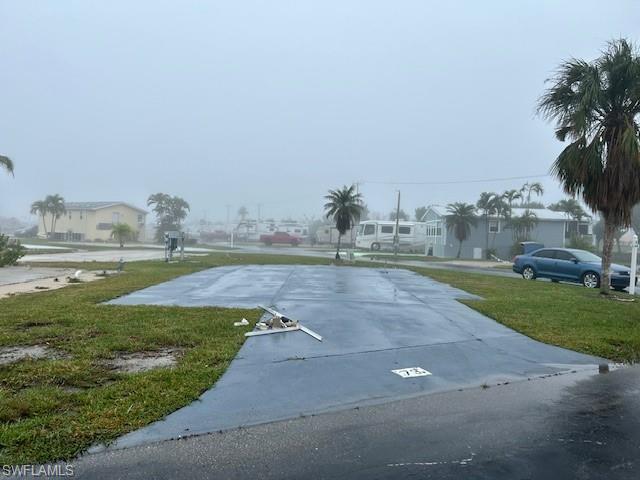 Beautiful corner lot ready for your RV or Manufactured home.  electric is done and painted concrete.