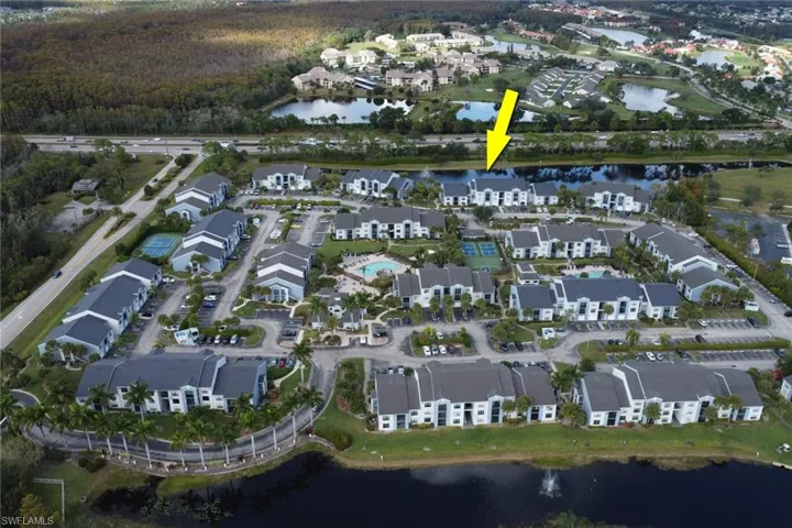 Aerial overview of property's location featuring a large body of water