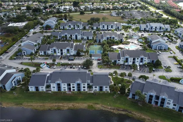 Aerial overview of property's location featuring a large body of water