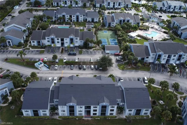 Aerial overview of property's location featuring a pool area