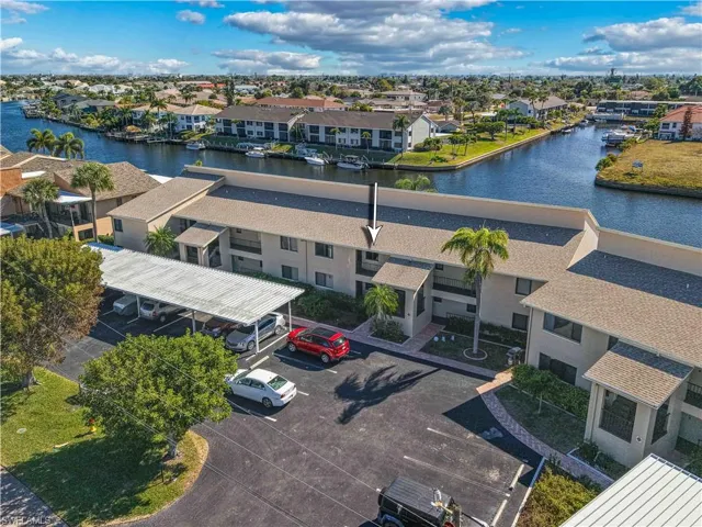 Aerial view of residential area with a large body of water