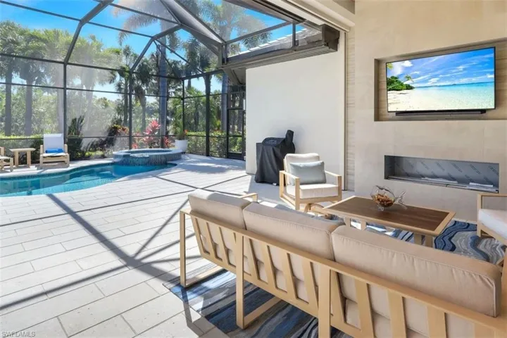 New pavers new fireplace with tv stone/tiled wall wood ceiling