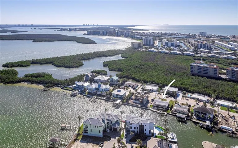 Birds eye view of property featuring Estero Bay and Gulf of Mexico view