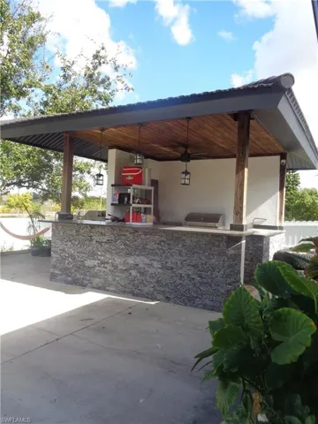 View of gazebo / terrace with a grill