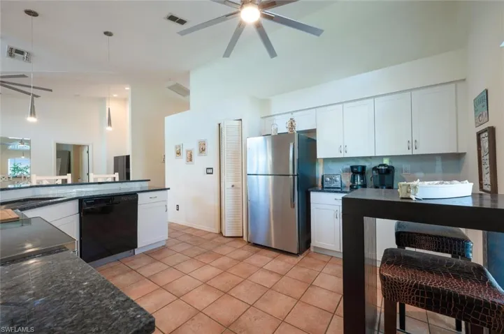 Updated kitchen cabinetry, countertops, and major appliances.  Ready for the cook!