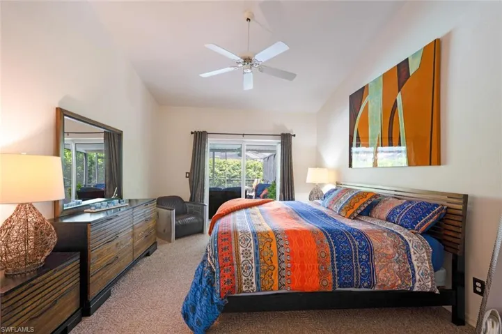 King bed with vibrant colors.
