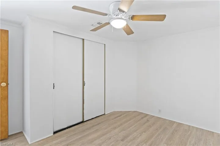 The guest bedroom is spacious and welcoming.