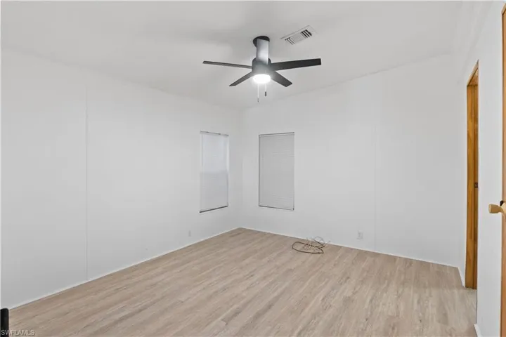 Generously sized primary suite with a large closet, and private access to the full en-suite bathroom.