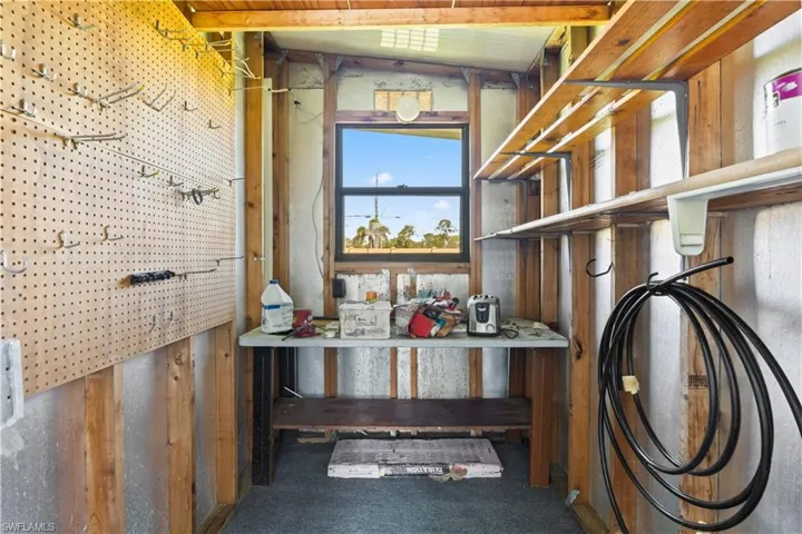 Handy outdoor storage shed offers extra space for tools, bikes, or seasonal décor.