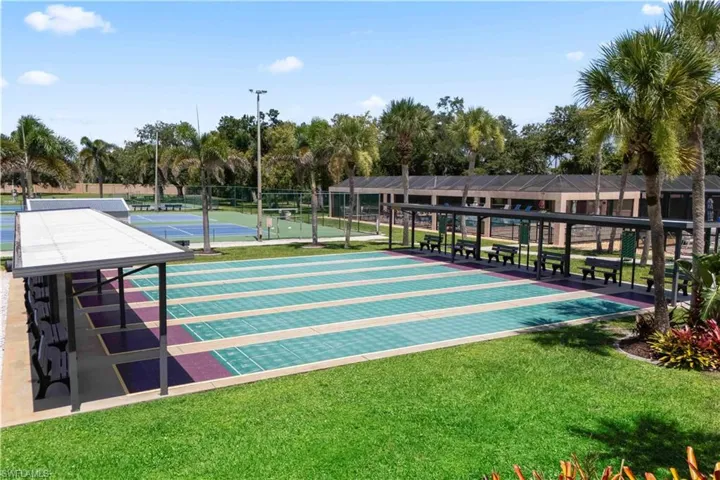 Enjoy sunny days on the shuffleboard courts, where residents gather to compete, connect, and unwind in a welcoming atmosphere.