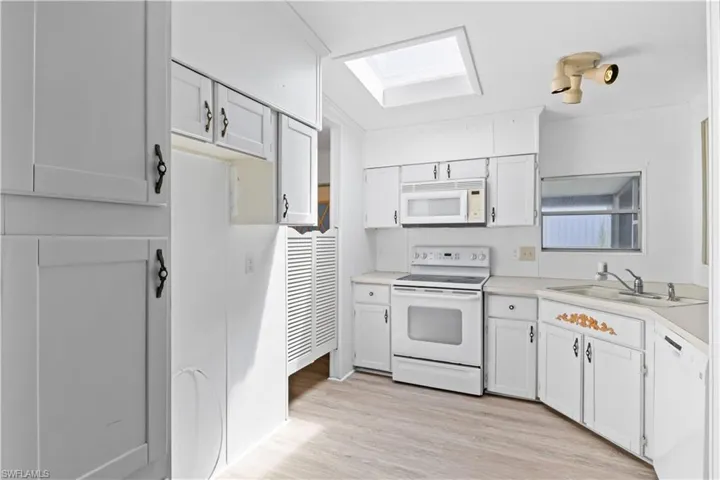 Pantry and cabinet space provide excellent organization and functionality.
