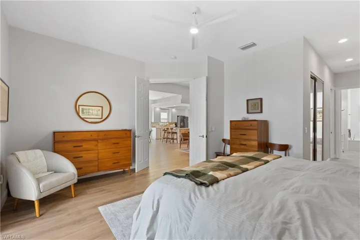 Owner's suite, ensuite bathroom, and new ceiling fan