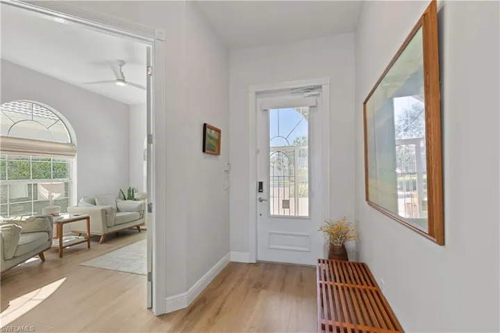 Entryway with den to the left