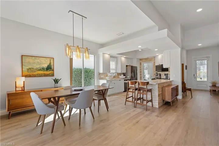 Dining space featuring a notable chandelier