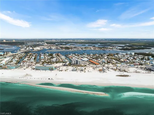 Drone / aerial view featuring a view of the beach and a water view