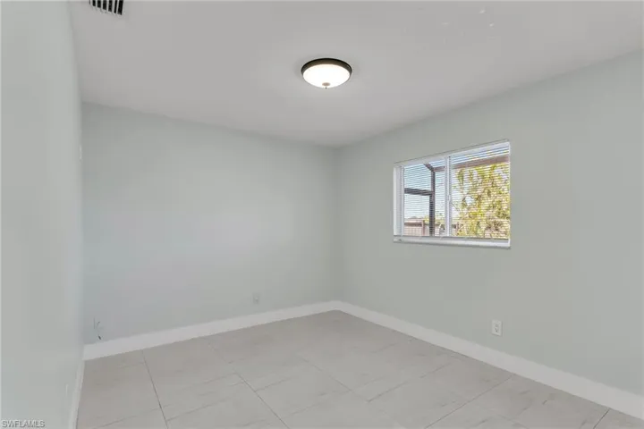 View of tiled spare room