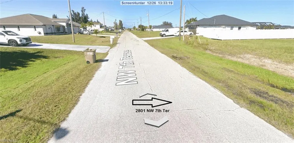 View of property looking up street.