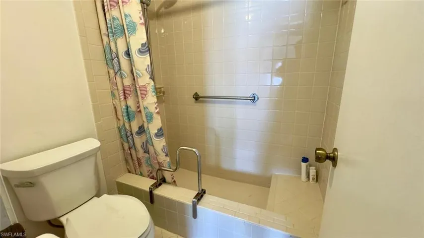 Bathroom featuring toilet and walk in shower