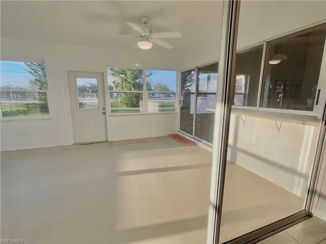 Florida room with pass-through bar to kitchen.