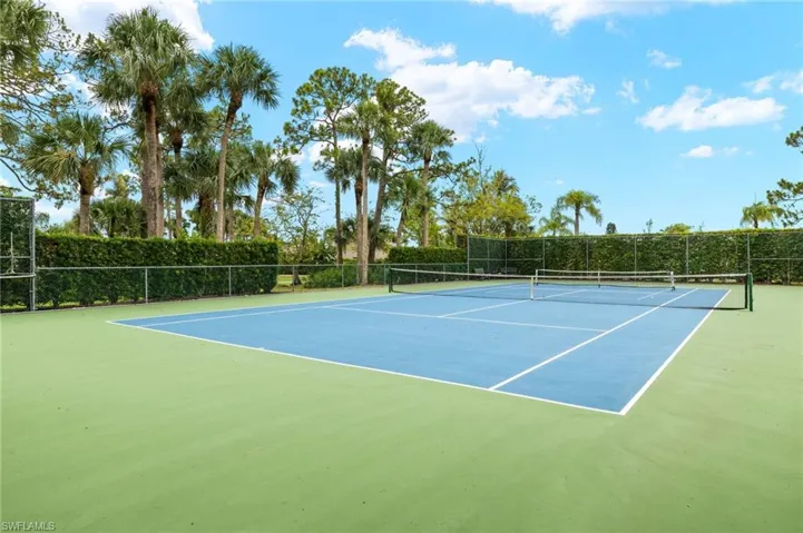 View of tennis court featuring community basketball court
