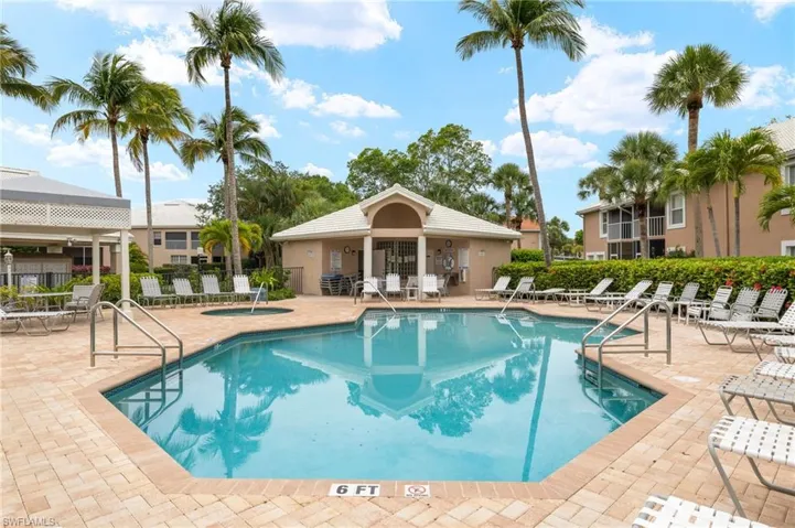 Community pool with a patio and a gazebo
