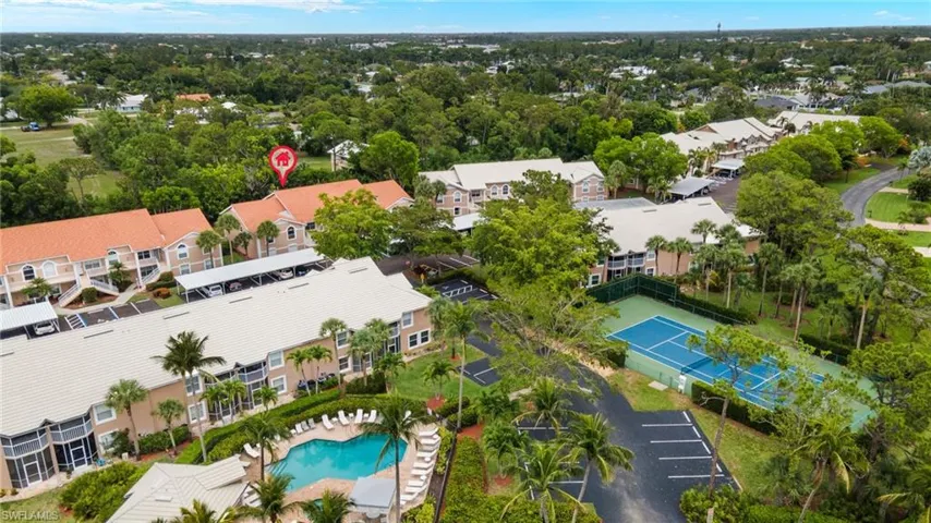 Aerial view of residential area with a pool