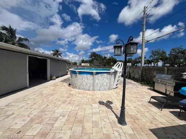 View of pool with a patio area