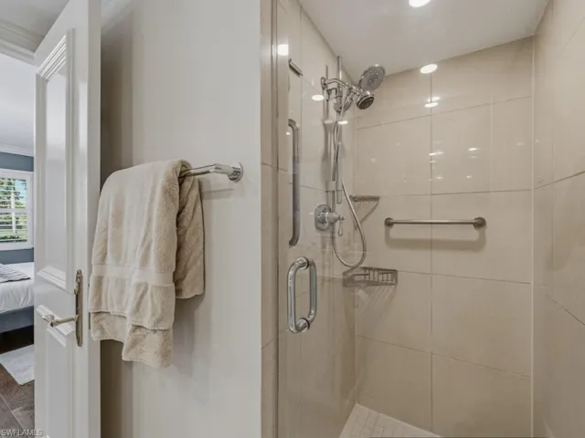Ensuite bathroom with a stall shower