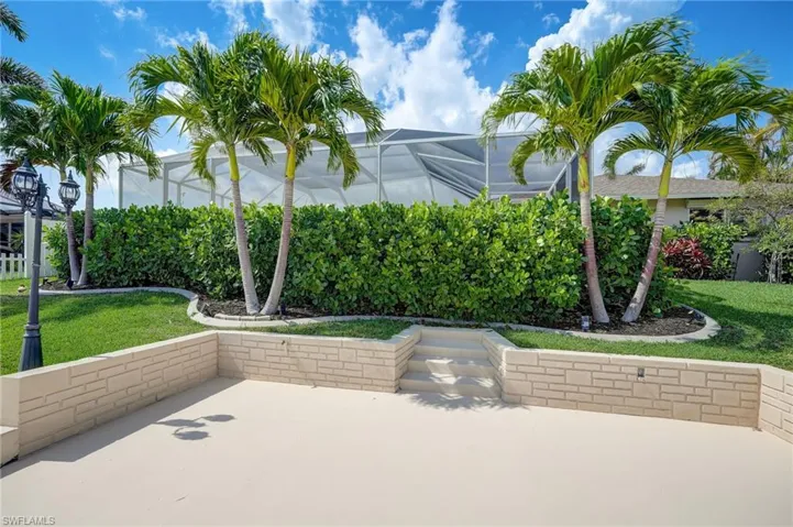 Sitting Area by Water / Mature Landscaping