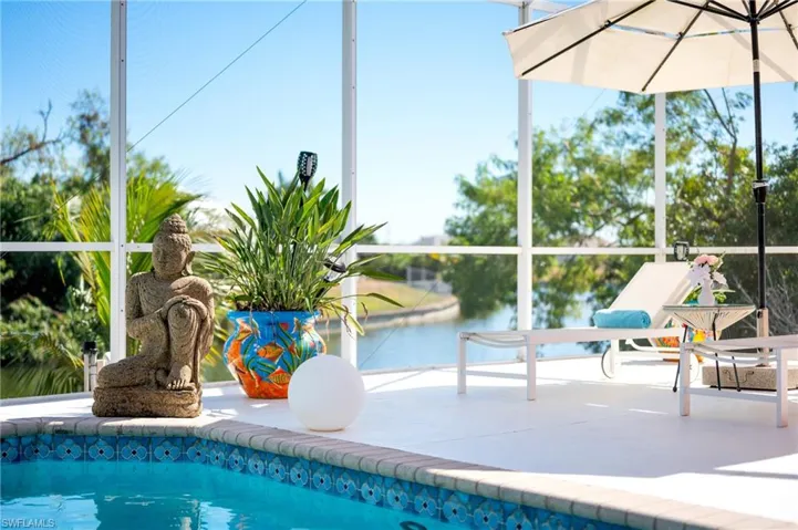 Swimming pool featuring a water view