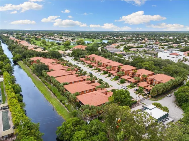 Aerial view with a residential view and a water view