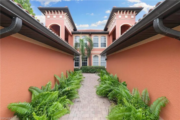 View of property exterior with stucco siding