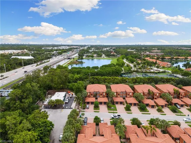 Bird's eye view with a residential view and a water view