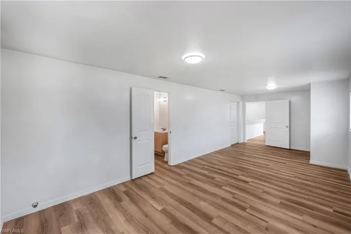 Den can be used as a separate living area or third bedroom as it features private access, full closet and an ensuite bathroom.